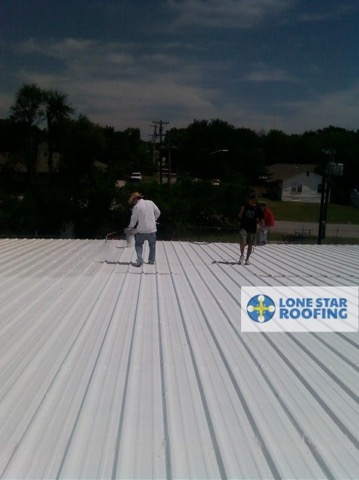 Metal Roof Coatings Warehouse Project Austin - During Midcoat